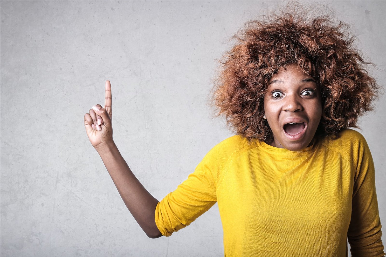 angry woman is screaming for noise of washing machine 